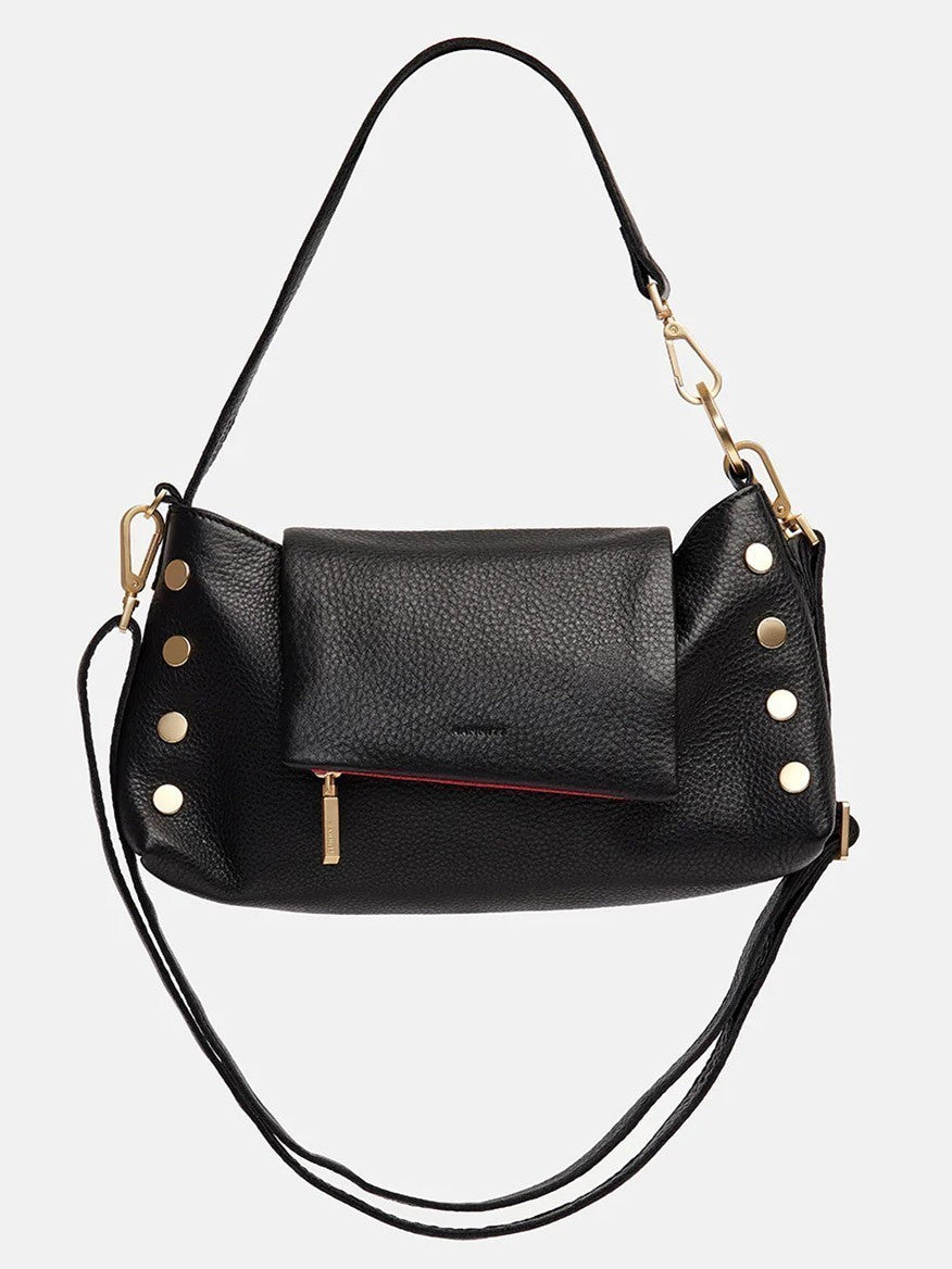 The Hammitt Los Angeles VIP Satchel in Black/Brushed Gold is a black pebbled leather handbag featuring a front pocket flap, gold hardware, and dual straps. This design also includes a convenient magnetic cell pocket for easy access.