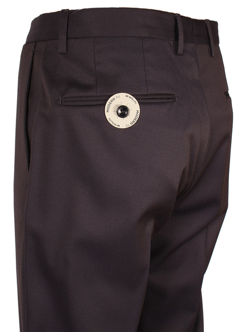 The back of a man's Incotex Matty 4-Season Trouser in Navy with a button and an unfinished hem.