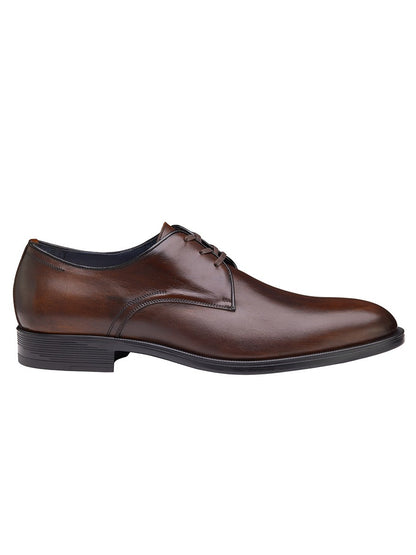 An J & M Collection Flynch Cap Toe in Mahogany Italian Calfskin men's brown derby shoe crafted from hand-stained calfskin with a rubber outsole, shown on a white background.