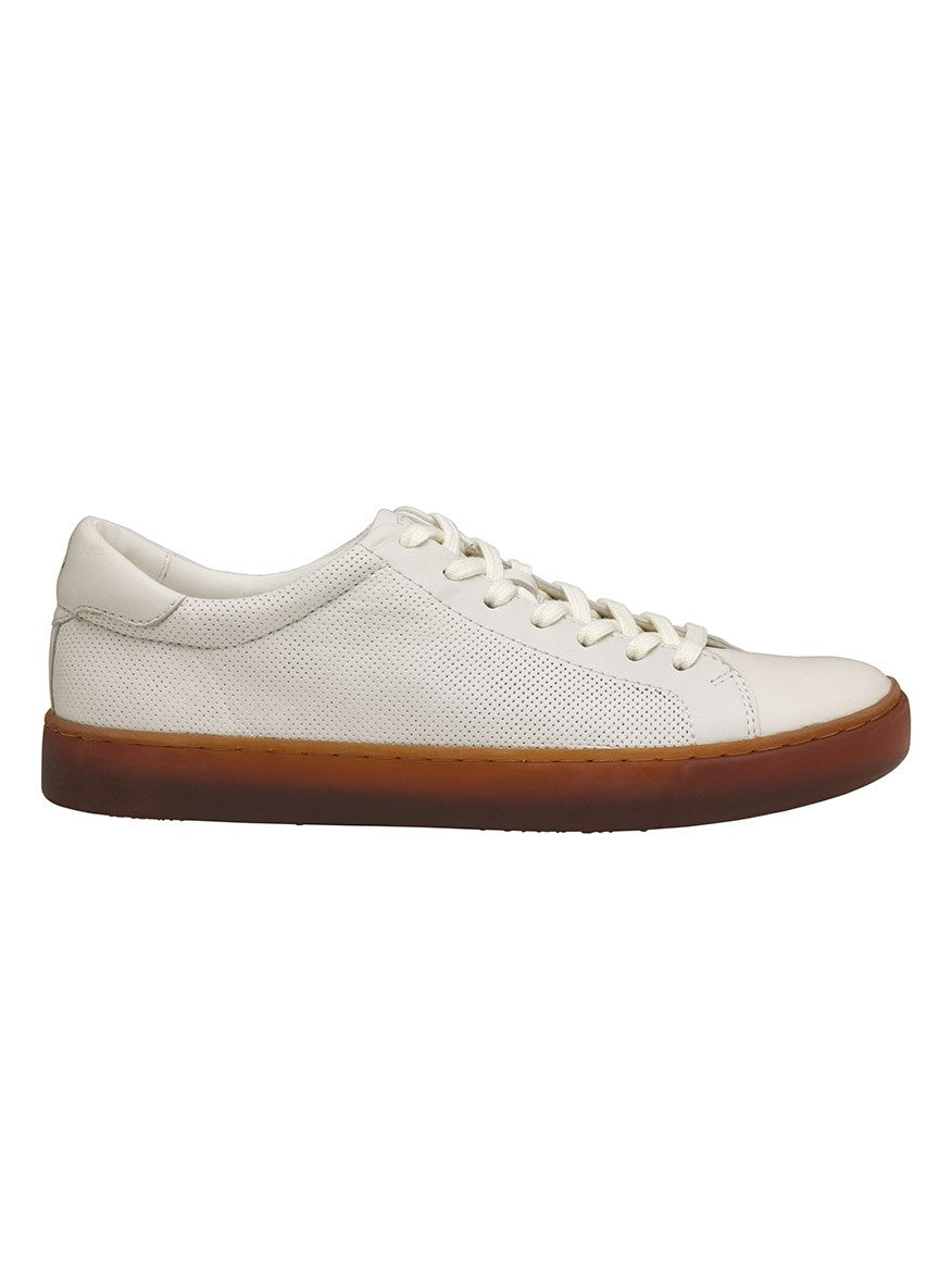 A J & M Collection Kempton Lace-To-Toe in White Sheepskin sneaker with brown soles and cushioning.