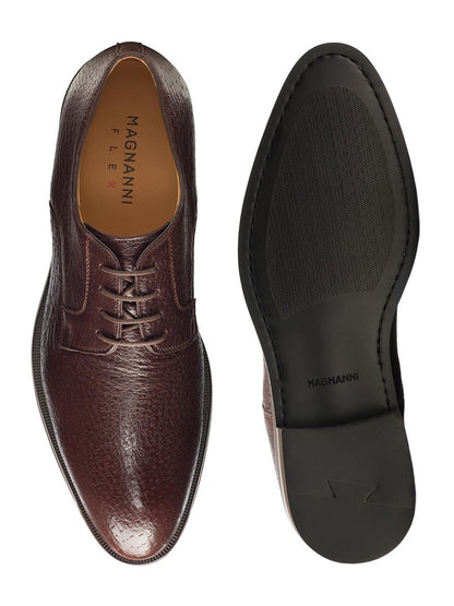 A pair of Magnanni Cusco in Brown oxford shoes in peccary leather on a white background.