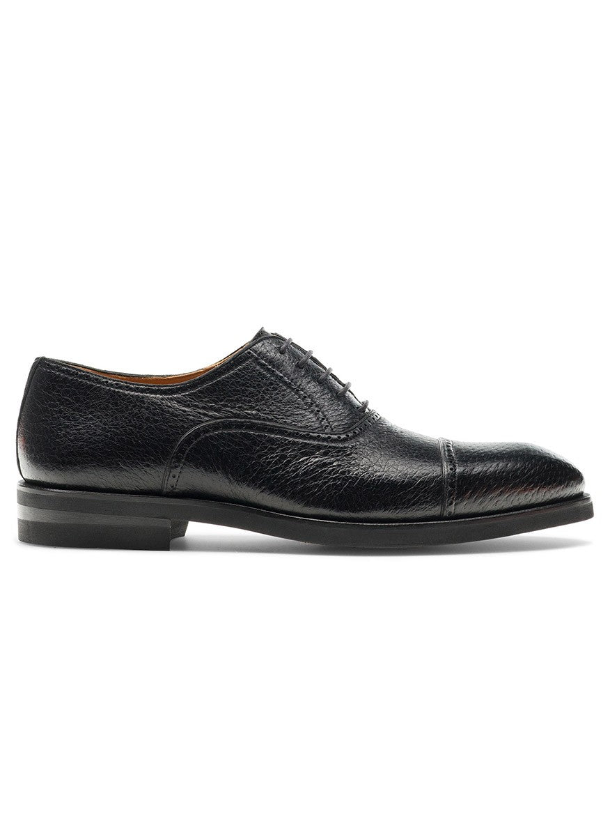 Magnanni Ica in Black cap toe Oxford dress shoe on a white background.