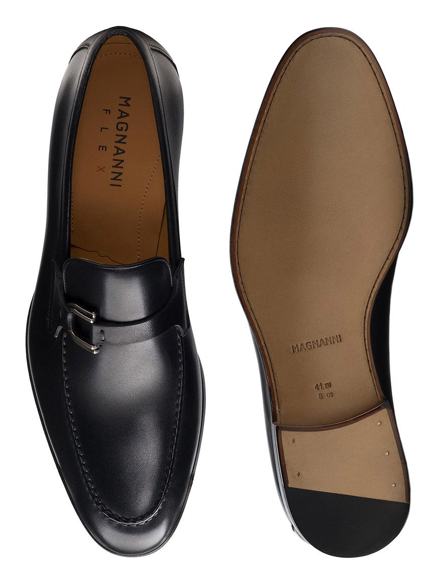 A pair of Magnanni Silvano in Black loafers with a buckle from the Silvano Línea Flex collection.