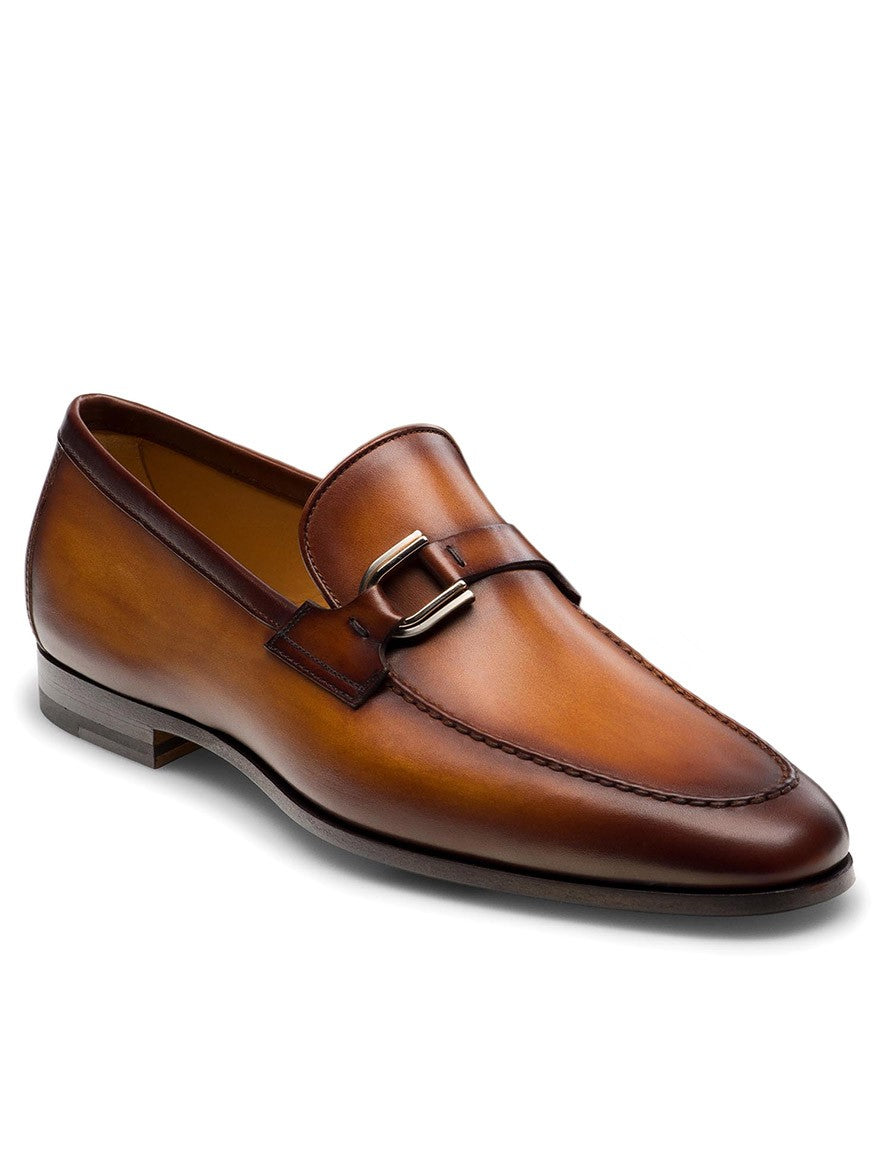 A Magnanni Silvano in Cuero men's brown loafer with a buckle.