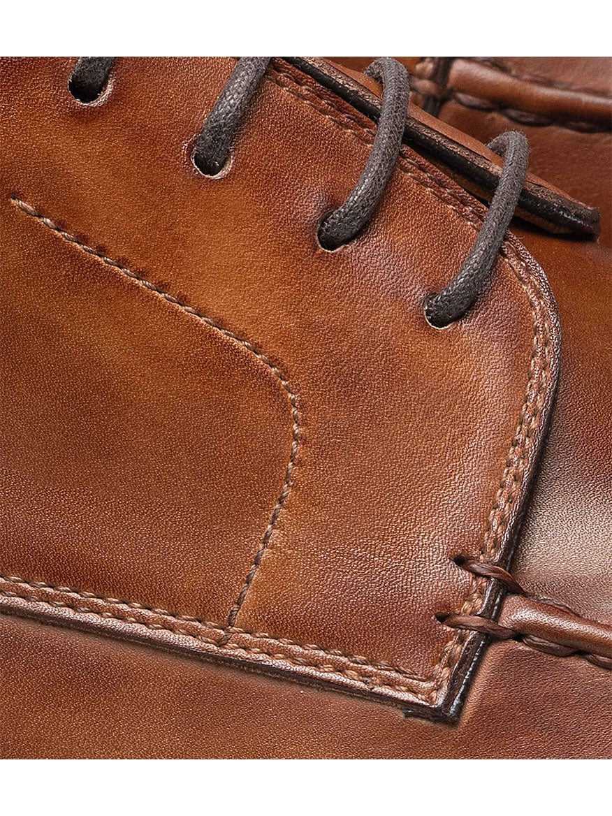 A close up of the Magnanni Alva in Tabaco, a smart-casual derby shoe in brown calfskin leather.