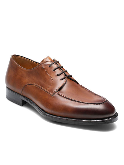 A men's smart-casual Magnanni Alva in Tabaco derby shoe crafted with Bologna construction from calfskin leather, showcased on a white background.