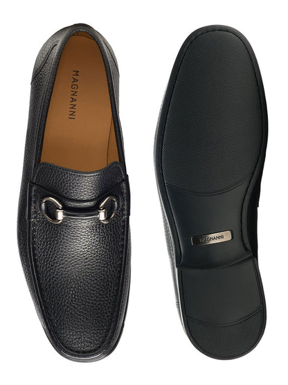 A pair of Magnanni Blas III in Black loafers with a metal buckle and cushioned rubber sole.