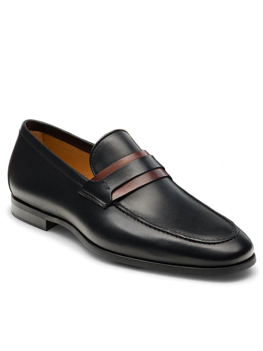 A Magnanni Daniel in Black/Midbrown loafer with a brown and black stripe from the Línea Flex Collection.