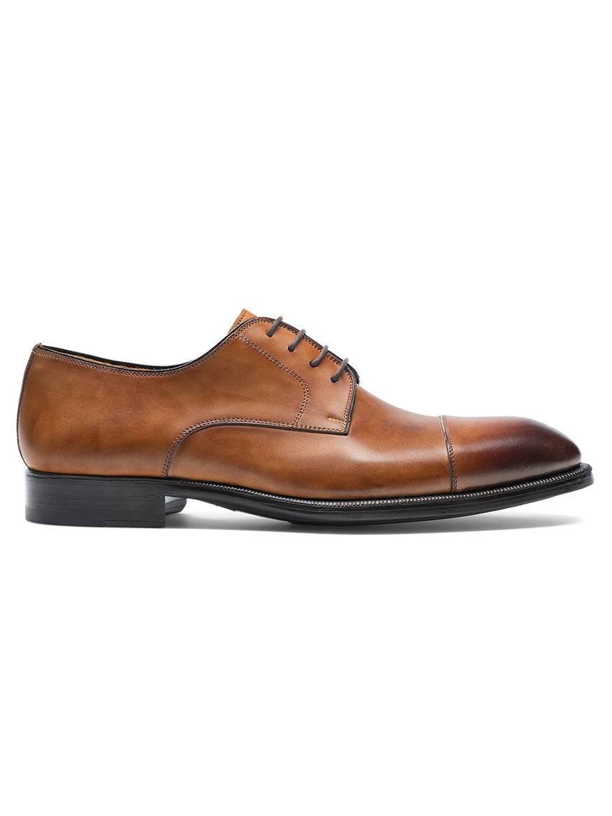 Magnanni Harlan in Tabaco calfskin leather derby shoes with laces on a white background.
