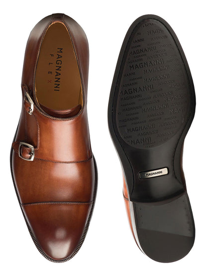 A pair of Magnanni Harris in Midbrown shoes with a double buckle monk strap on the side.