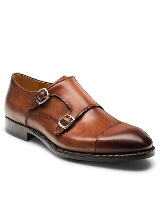 The Magnanni Harris in Midbrown double buckle monk strap shoe features Bologna construction.