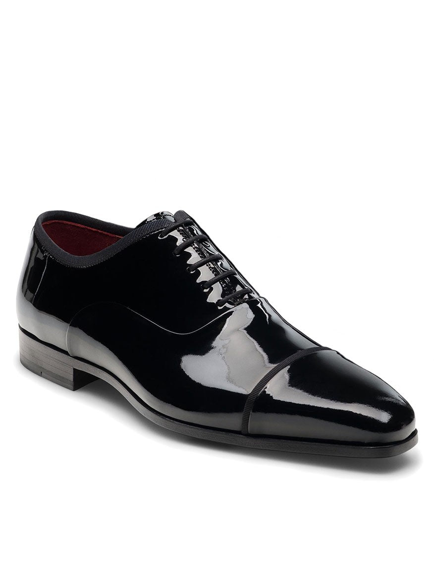 Magnanni Jadiel in Black Patent Oxford shoes are the perfect choice for those in need of a formal attire. These stylish shoes are made with glossy patent leather, making them a sophisticated and elegant option for any occasion.