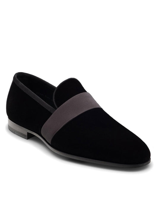 Magnanni's Magnanni Jenaro in Black Velvet is a black loafer with a grey stripe, perfect for formal occasions. This slipper loafer silhouette exudes sophistication and style.