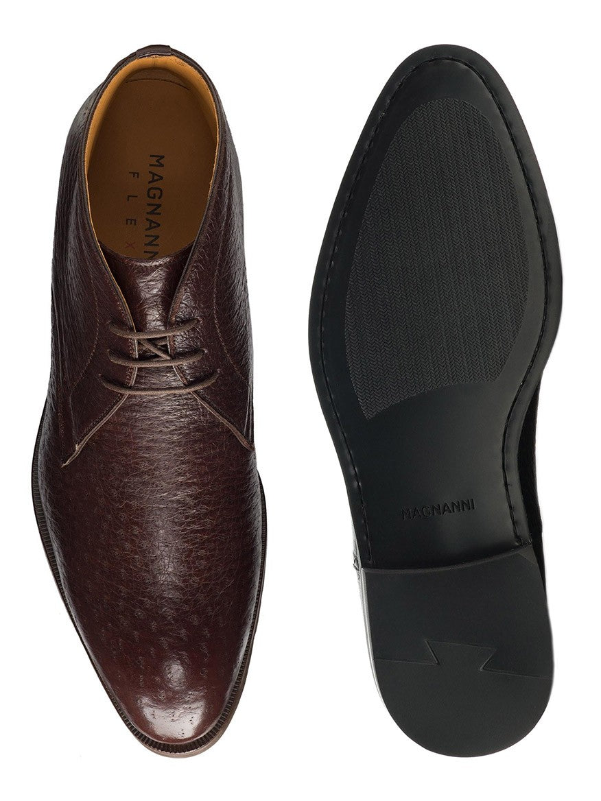 A Magnanni Tacna in Brown leather dress shoe with its sole displayed next to it.
