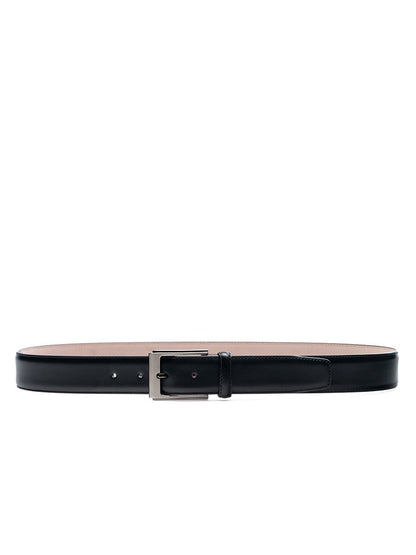 A Magnanni Vega Belt in Black made of calfskin leather showcasing an Arcade patina, placed on a white background.