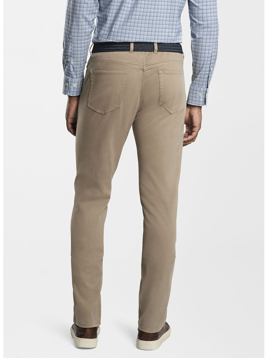 The back view of a man wearing Peter Millar Ultimate Sateen Five-Pocket Pant in Grain.