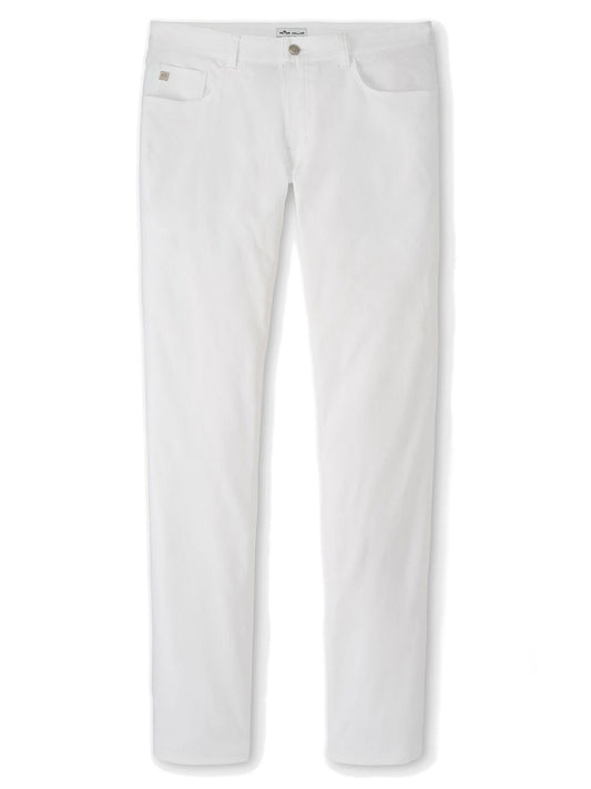 The Peter Millar Performance Five-Pocket Pant in White is showcased against a plain background, highlighting its two-way stretch and moisture-management technology.