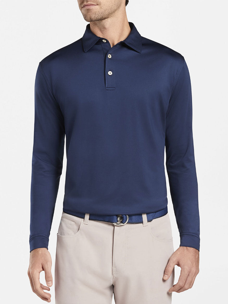 The Peter Millar Solid Stretch Jersey Long Sleeve Polo in Navy.