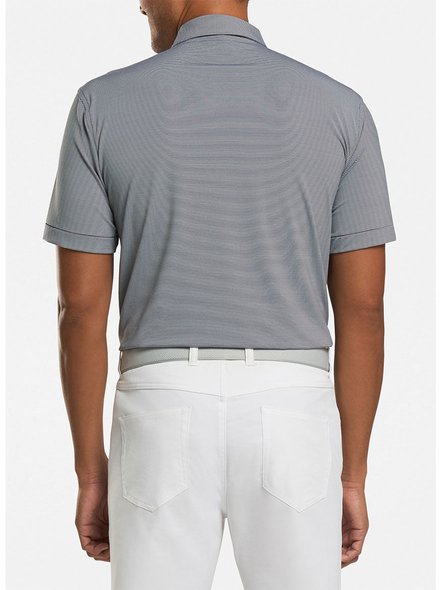 Wearing the Peter Millar Jubilee Stripe Performance Polo in black and white pants, a person from the back exemplifies style and practicality with its moisture-wicking fabric.