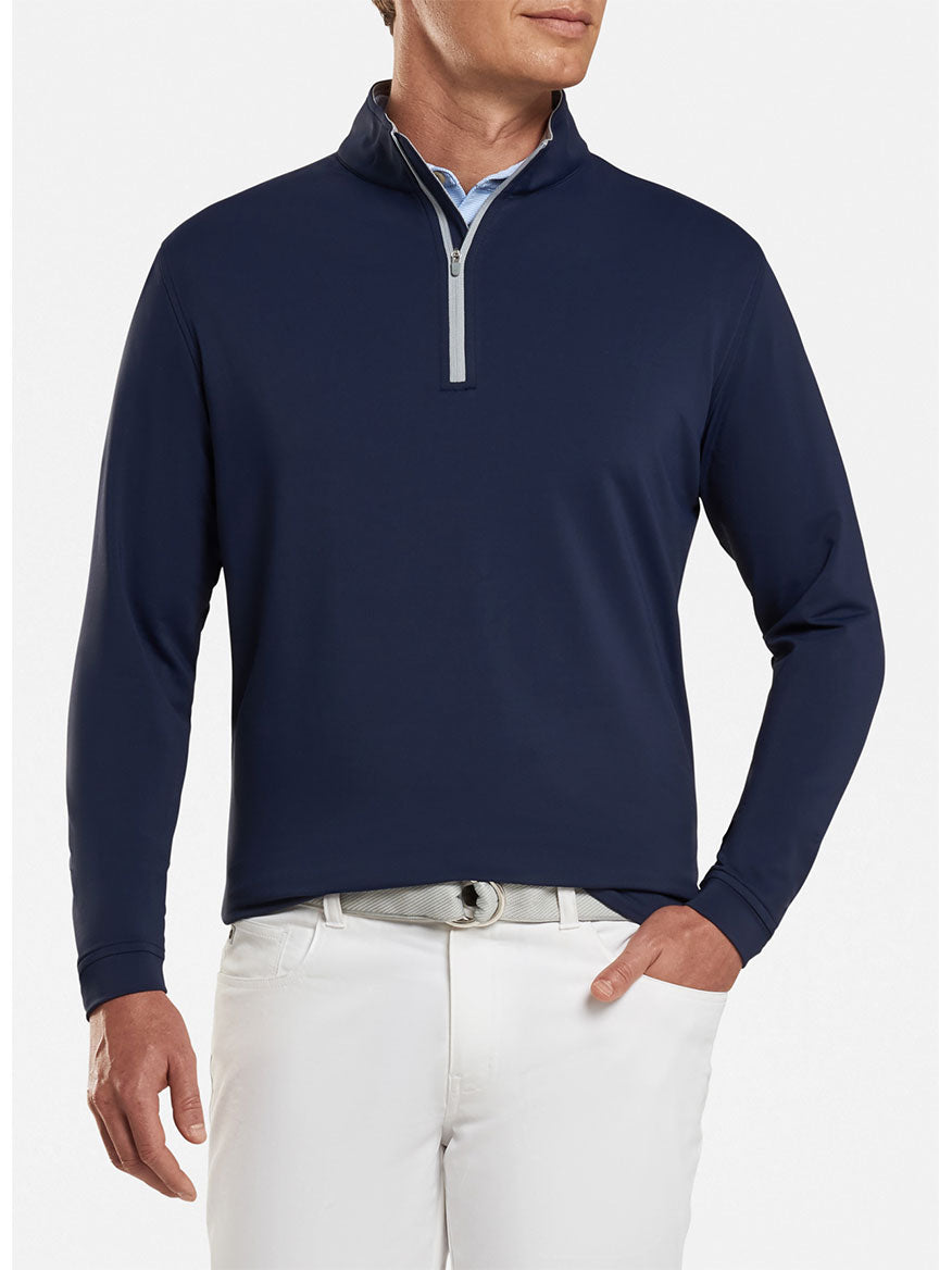 The Peter Millar Perth Performance Quarter-Zip in Navy offers comfort and performance-focused features for men.