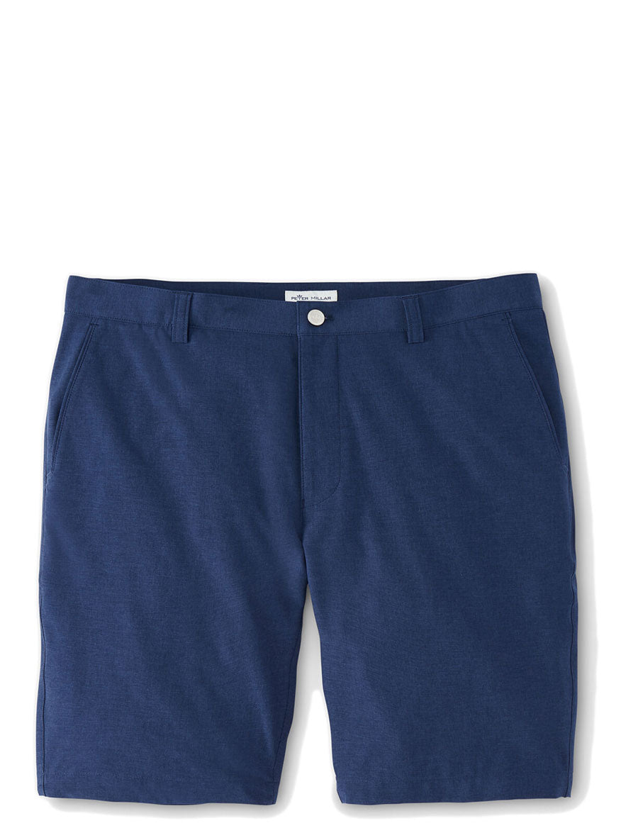 Versatile essential Peter Millar Shackleford Performance Hybrid Short in Navy with buttons and pockets.