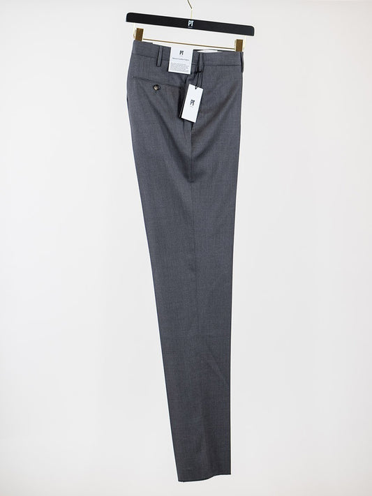 A PT01 Estrato 120s Lux Wool Twill Trouser in Charcoal Melange hanging on a hanger made with Italian natural stretch fabric for maximum comfort.