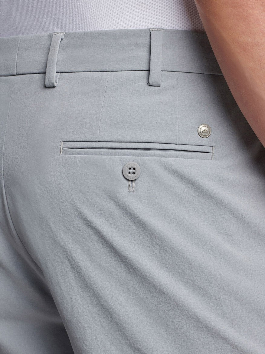 Close-up of the back of Peter Millar Surge Performance Short in Gale Grey featuring a buttoned back pocket.