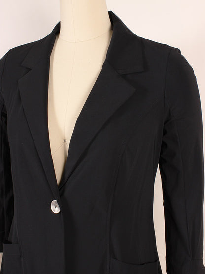 A mannequin wearing a black Porto Jiffy Collared Jacket with one button closed, displayed against a plain background.