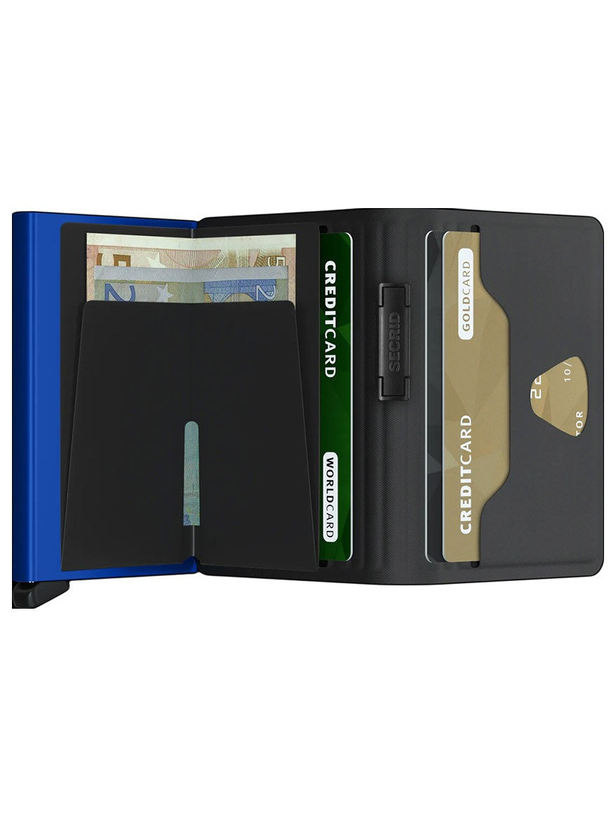 A small, black and blue Secrid Bandwallet TPU in Black & Cobalt with a credit card in it.