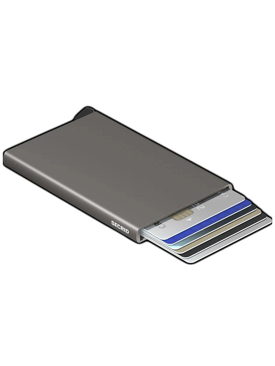 A Secrid Cardprotector in Earth Grey, a minimal wallet that securely holds a credit card with RFID safe protection. Perfect for those looking for Secrid products.