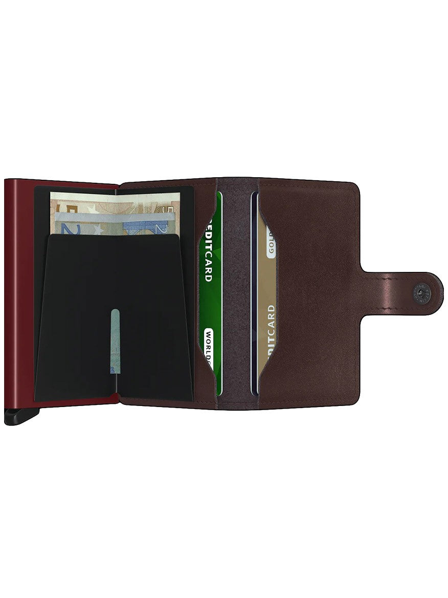 Open Secrid Miniwallet Metallic in Moro displaying banknotes, credit cards, and featuring RFID protection.