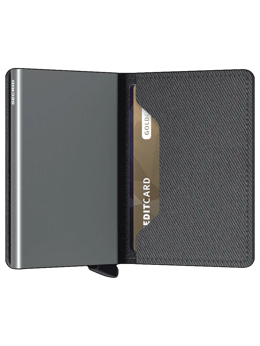 A Secrid Slimwallet Twist in Grey with a credit card in it.
