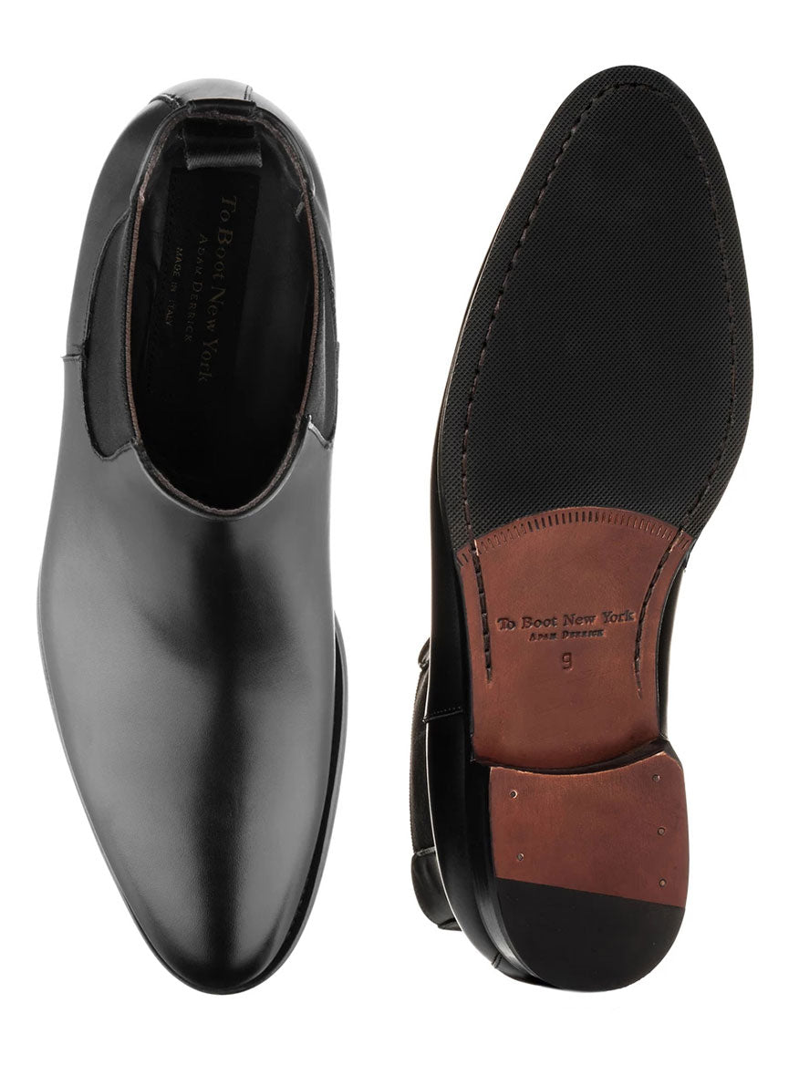 A pair of To Boot New York Shelby black leather dress shoes crafted from Italian calf, viewed from the top and bottom.