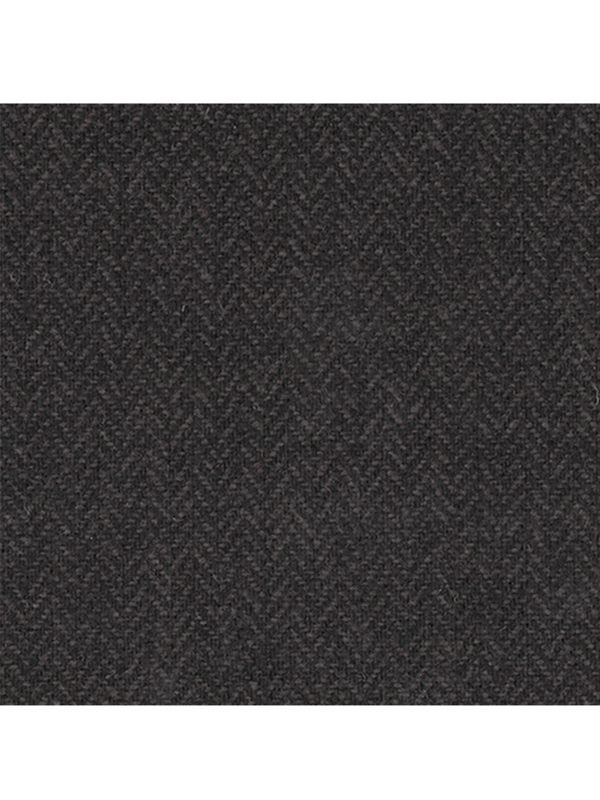 A close-up of a Wigéns Pub Cap in Black Herringbone wool blend fabric with a herringbone pattern.